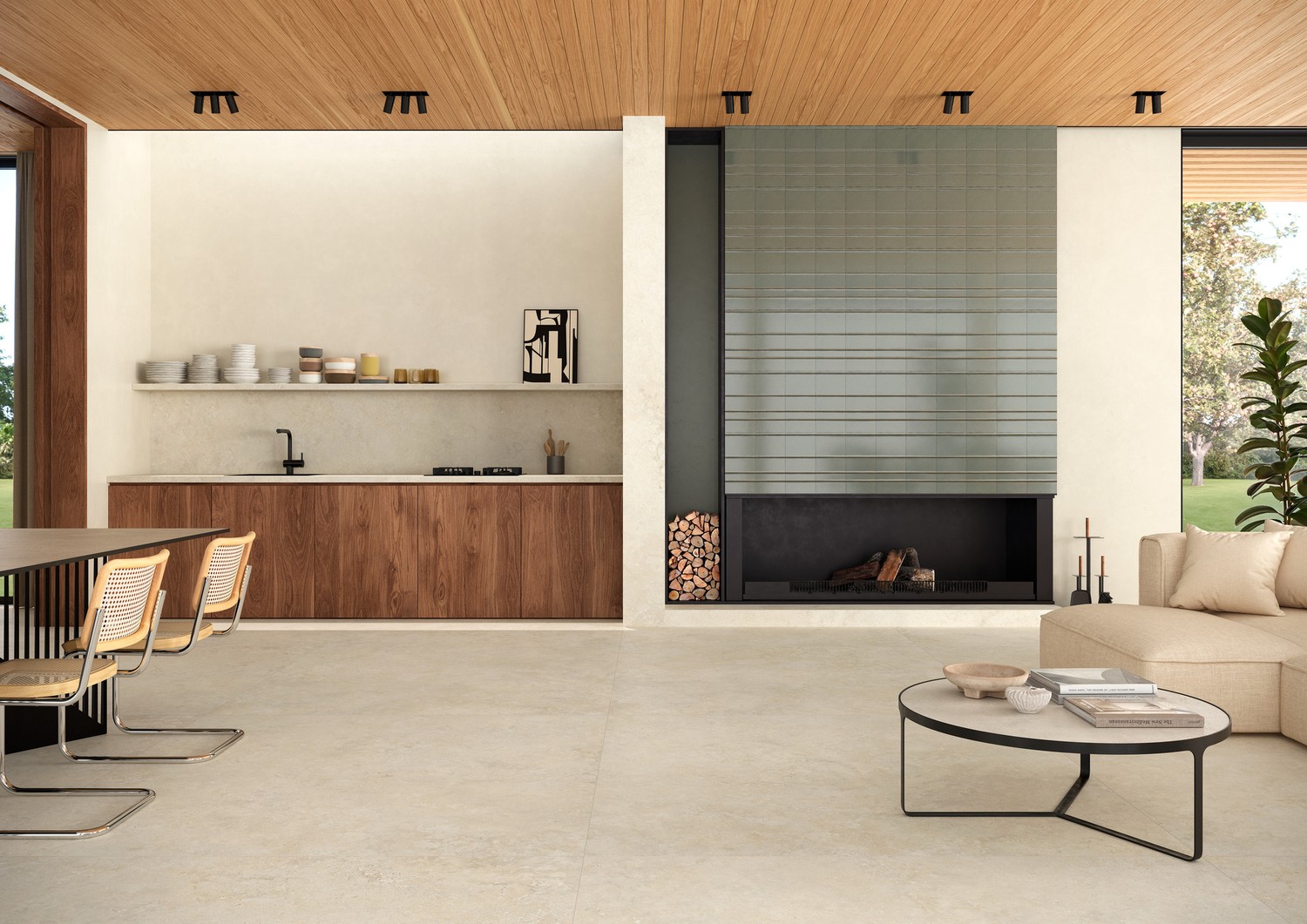 Minimalistyczny salon z kuchnią, kominkiem i drewnem. fot. Marazzi