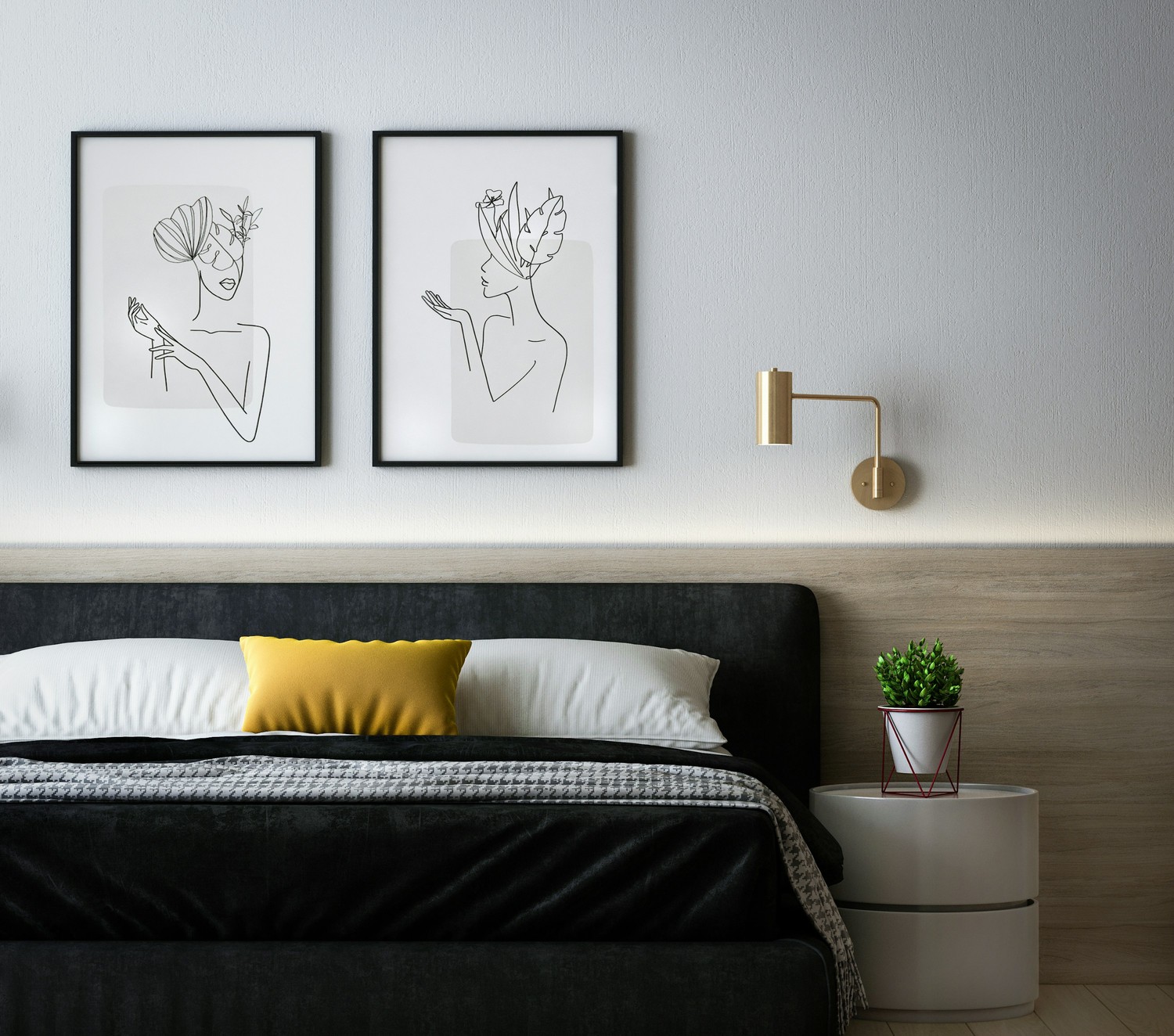 Minimalistyczna sypialnia z czarnym łóżkiem i grafiką fot. Unsplash