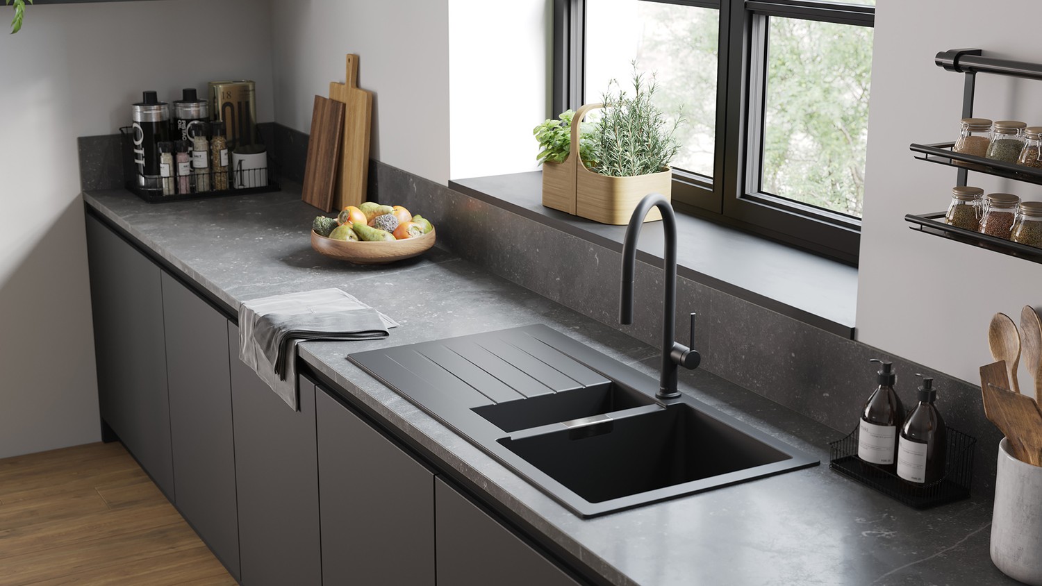 Minimalistyczna kuchnia z czarnym zlewem przy oknie fot. Hansgrohe