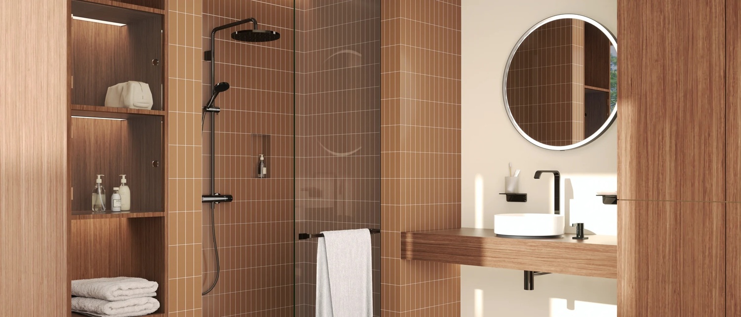 Minimalistyczny prysznic walk-in z owalnym lustrem fot. Dornbracht