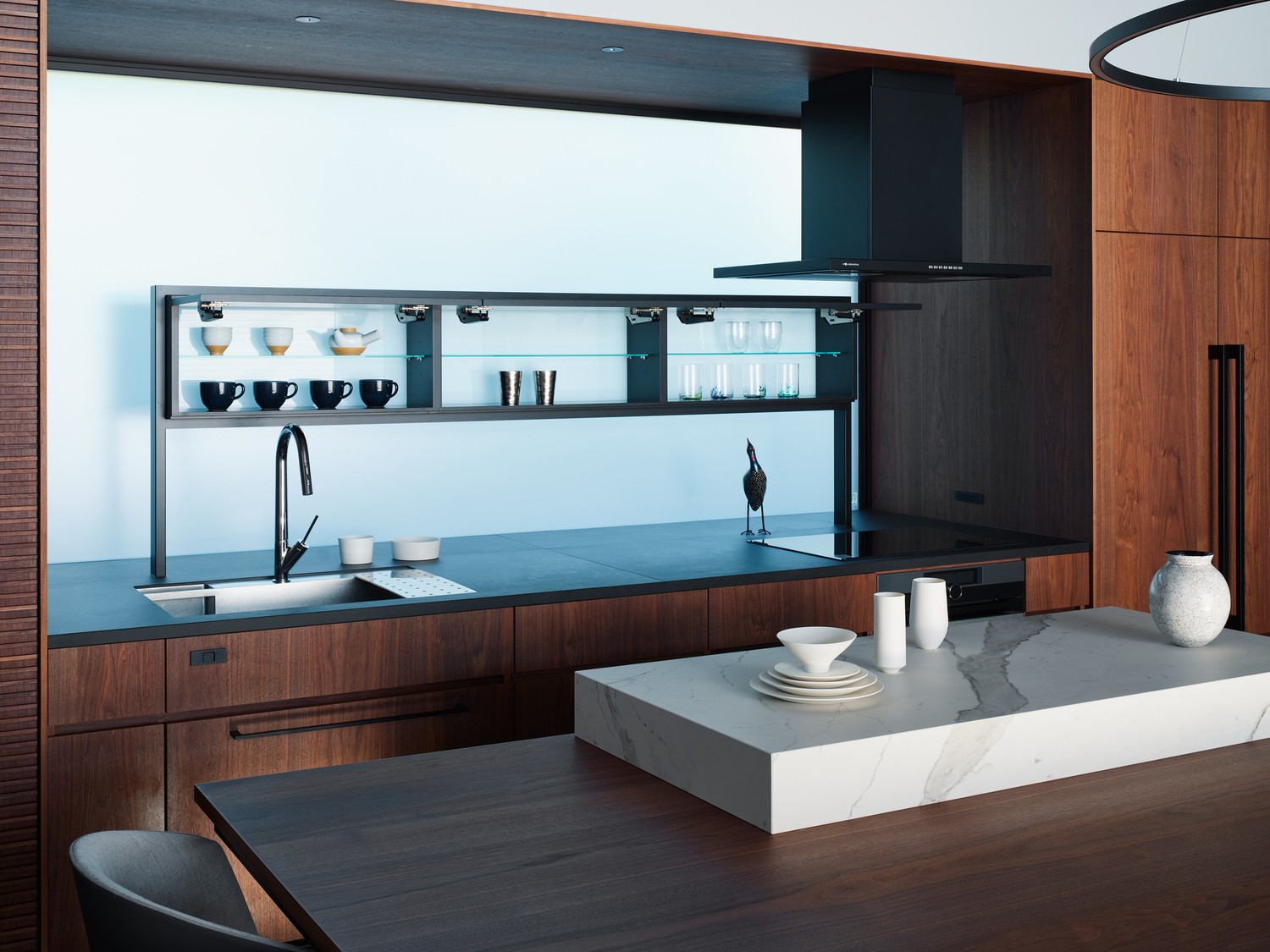 Minimalistyczna kuchnia z czarną baterią i wyspą fot. Hansgrohe