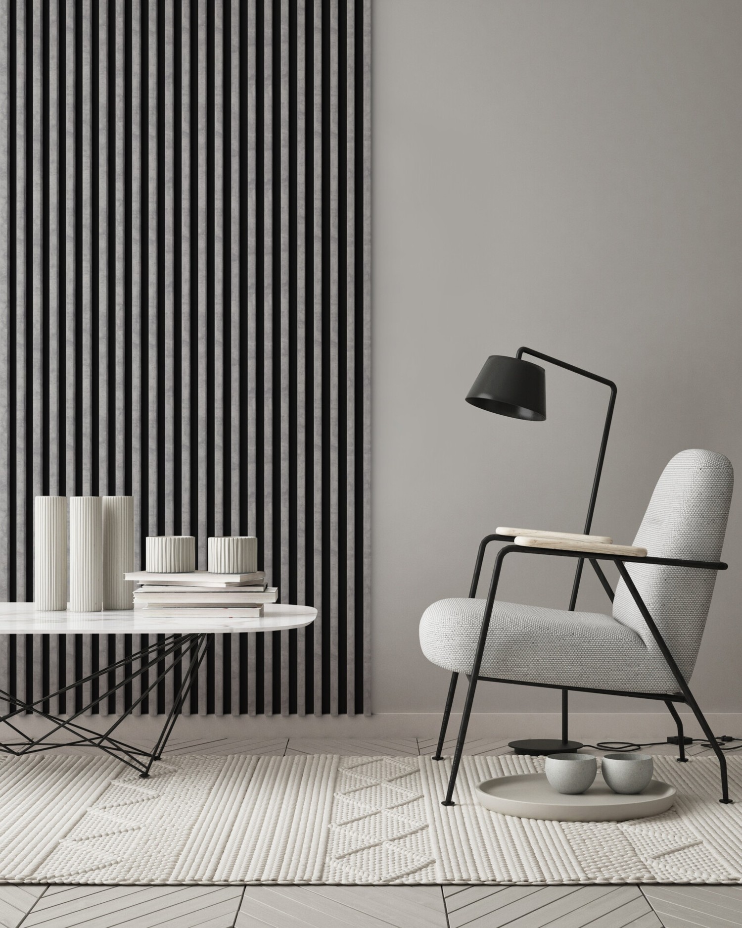 Minimalistyczny salon z fotelem i czarną lampą fot. Stegu