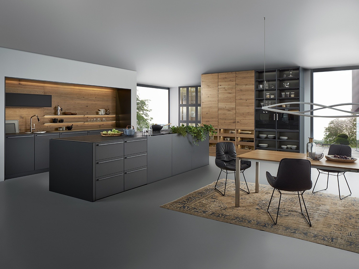 Minimalistyczna kuchnia z wyspą i drewnem fot. Hansgrohe