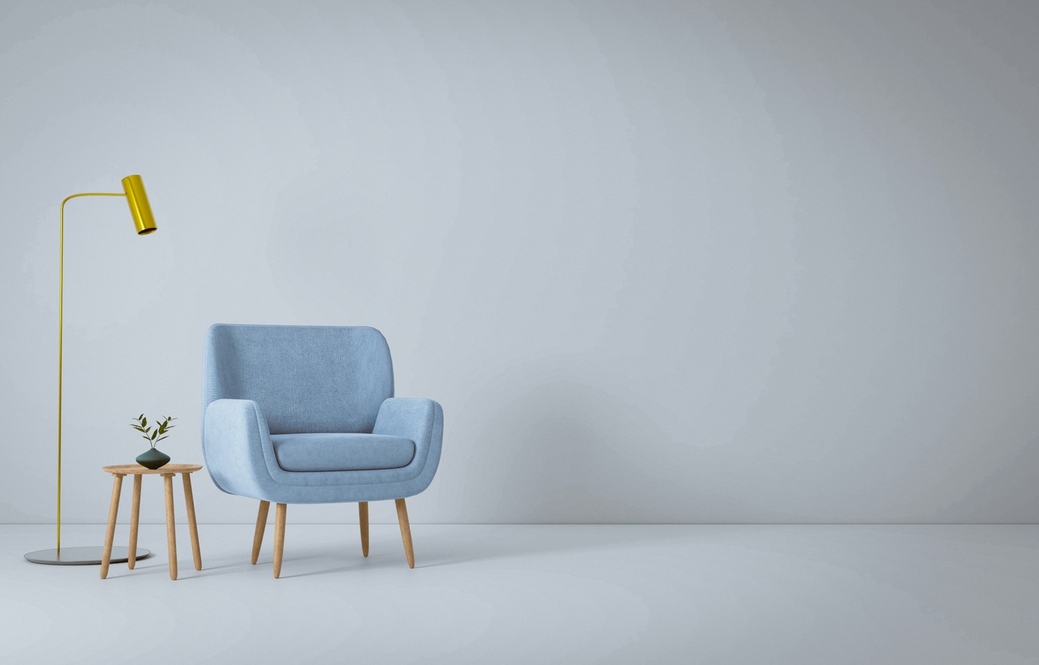 Minimalistyczny salon z błękitnym fotelem i lampą fot. Unsplash